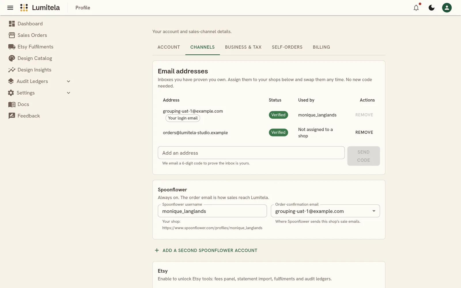 Your email addresses on the Profile page, each with its status and the shop that uses it